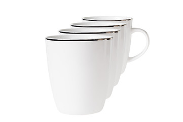 Image showing Four empty cup standing in line