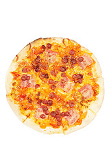 Image showing A whole pizza  with  sausage  and bacon