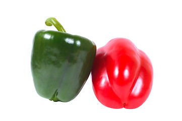 Image showing Two peppers - green and red on a white background