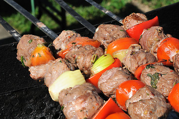 Image showing Kebabs, threaded on a skewer