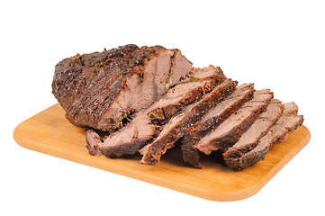 Image showing Roast beef on a wooden board