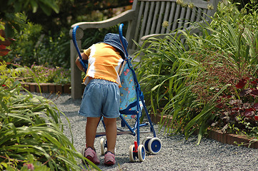 Image showing Toddler and stroller I