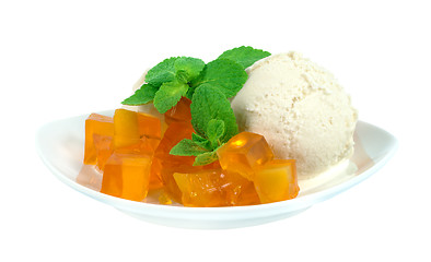 Image showing Ice cream and jelly, decorated with mint leaves.