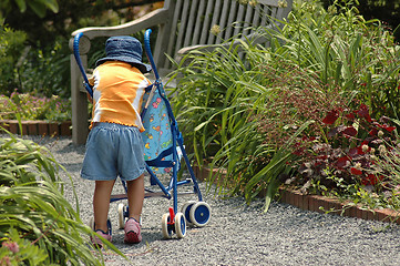 Image showing Toddler with Stroller II