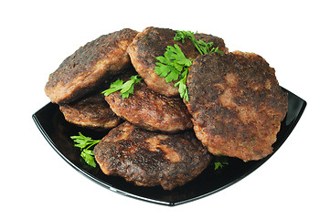 Image showing Beef patties on a plate