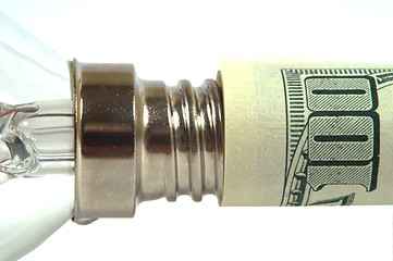 Image showing The lamp is inserted into the dollar