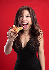 Image showing Female eating pizza