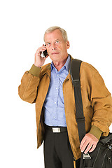 Image showing Senior taking on his smartphone