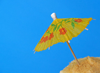 Image showing luau party cupcake with umbrella