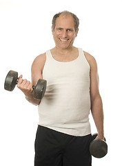 Image showing middle age senior man working out with dumbbell weights