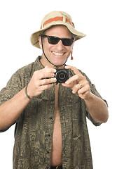 Image showing middle age senior tourist male digital camera