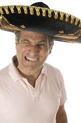 Image showing middle age senior tourist male wearing Mexican somebrero hat