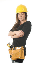 Image showing female worker carpenter builder with tool belt and hard hat helm