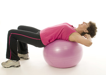 Image showing woman exercising core training fitness ball