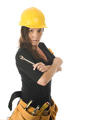 Image showing female worker carpenter builder with tool belt and hard hat helm