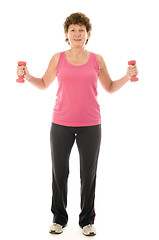 Image showing senior middle age woman exercising with dumbbells 