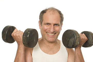 Image showing middle age senior man working out with dumbbell weights