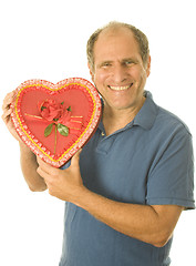 Image showing middle age senior man  box of Valentine day chocolate candy