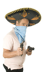 Image showing middle age senior tourist male wearing Mexican somebrero hat cow