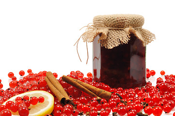 Image showing Jar of homemade red currant jam with fresh fruits