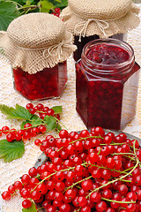 Image showing Jars of homemade red currant jam with fresh fruits