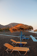 Image showing Sunbeds in Perissa, Santorini, Greece