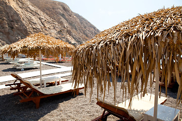 Image showing Sunbeds in Perissa, Santorini, Greece