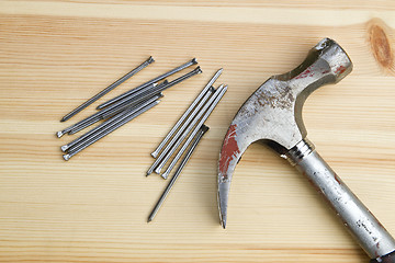 Image showing Old hammer and nails 