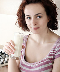 Image showing Young people eating milk with cereals