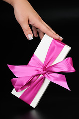 Image showing Gift box with and woman's hand