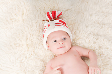Image showing Newborn baby in chritstmas hat