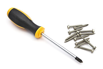 Image showing Yellow screwdriver and screws