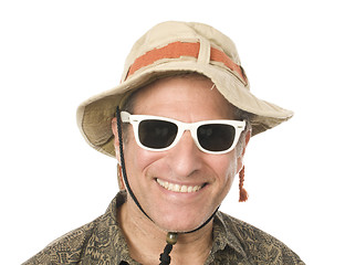 Image showing senior tourist wearing funny hat sunglasses