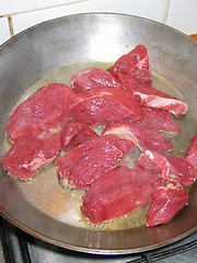 Image showing Frying meat