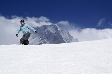 Image showing Snowboarding in high mountains