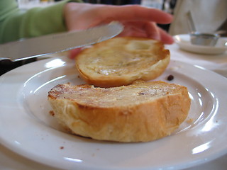 Image showing Buttering scons