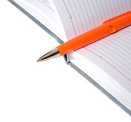 Image showing The diary and pen isolated on a white background