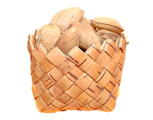 Image showing Almonds in a basket on white background