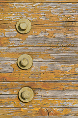 Image showing Wooden texture with bolts