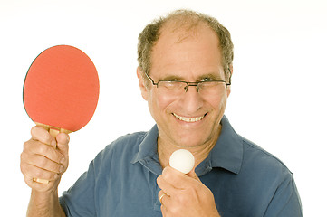 Image showing senior man playing ping-pong table tennis