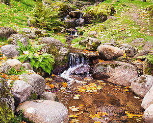 Image showing Stream among stones in autumn park