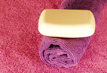 Image showing Soap bar on colorful towels