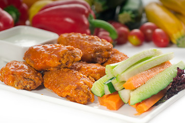 Image showing  buffalo chicken wings served with pinzimonio