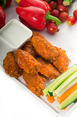 Image showing  buffalo chicken wings served with pinzimonio