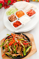 Image showing original fajita sizzling hot  on iron plate