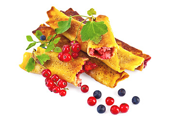 Image showing Pancakes with blueberries and red currants