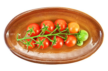 Image showing Red tomatoes on a plate