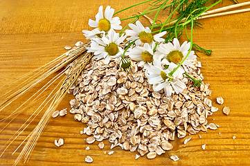 Image showing Rye flakes with daisies