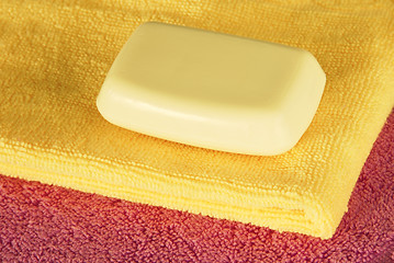 Image showing Soap bar on colorful towels