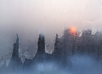 Image showing ice and sun on winter windowpane 